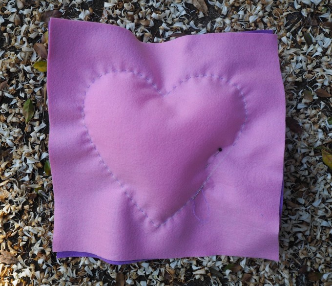 fringed heart cushion