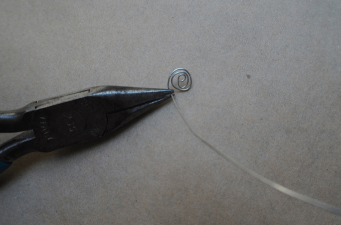 curling wire to make butterfly mobile