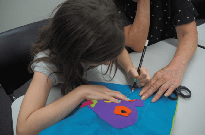 making a softie at a sewing class to kids