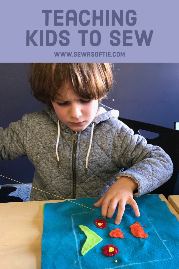 teaching a child to sew