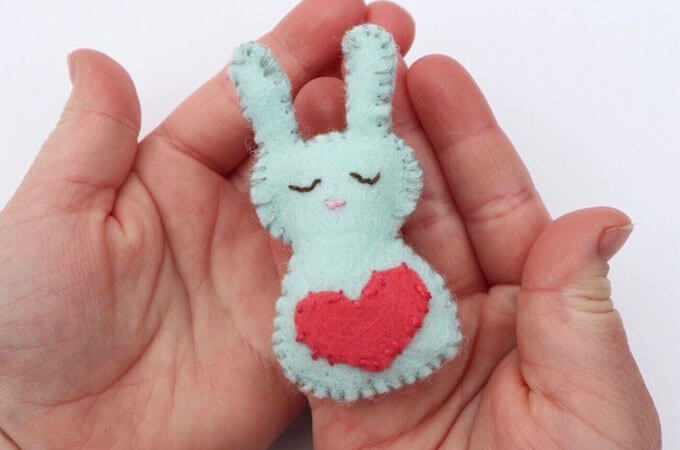 bunny softie sewn by a child to gift to someone in her community